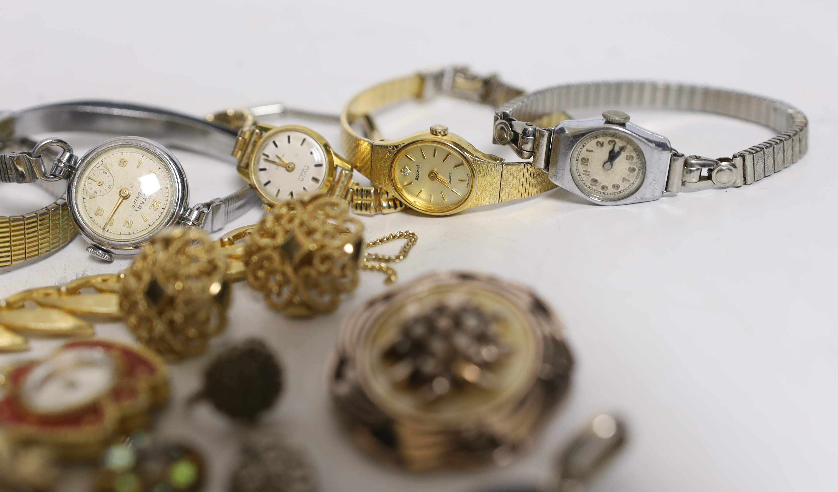 A mixed group of wrist watches including Rotary and 9ct gold Accurist and jewellery including 925 and costume.